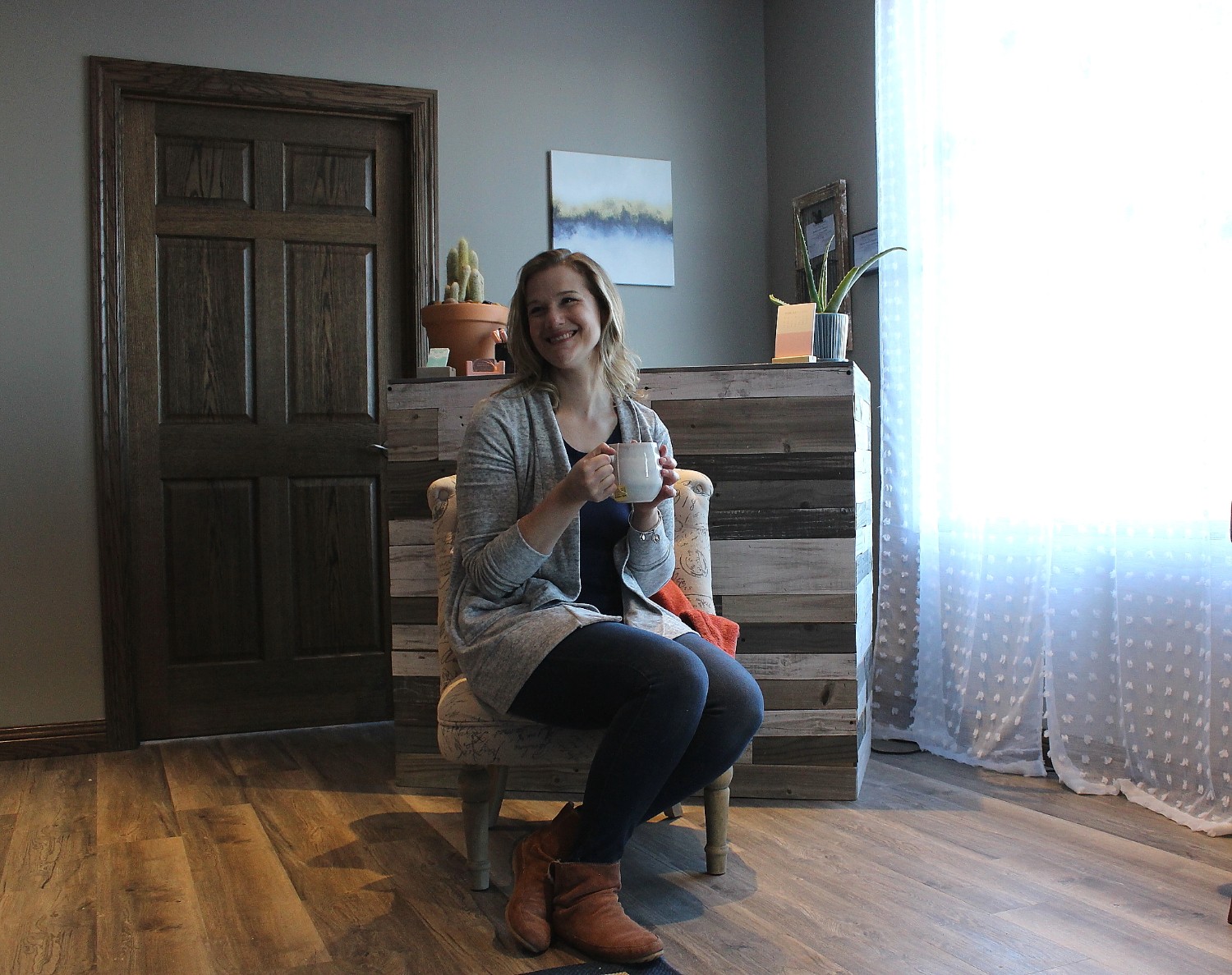 IMG_2860 Eva enjoys a cup of coffee in a chair