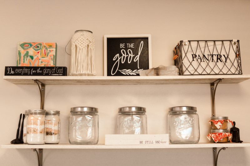 vibrational-auricular-technique Shelves holding jars and signs
